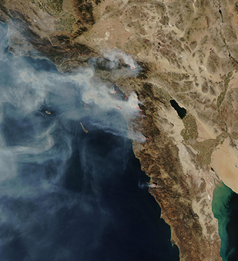 NASA satellite image of the October 2007 Southern California wildfires, showing active fire zones and smoke plumes
